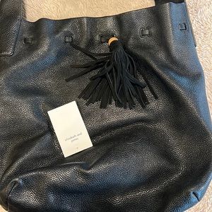 Lightly used Elizabeth and James bag